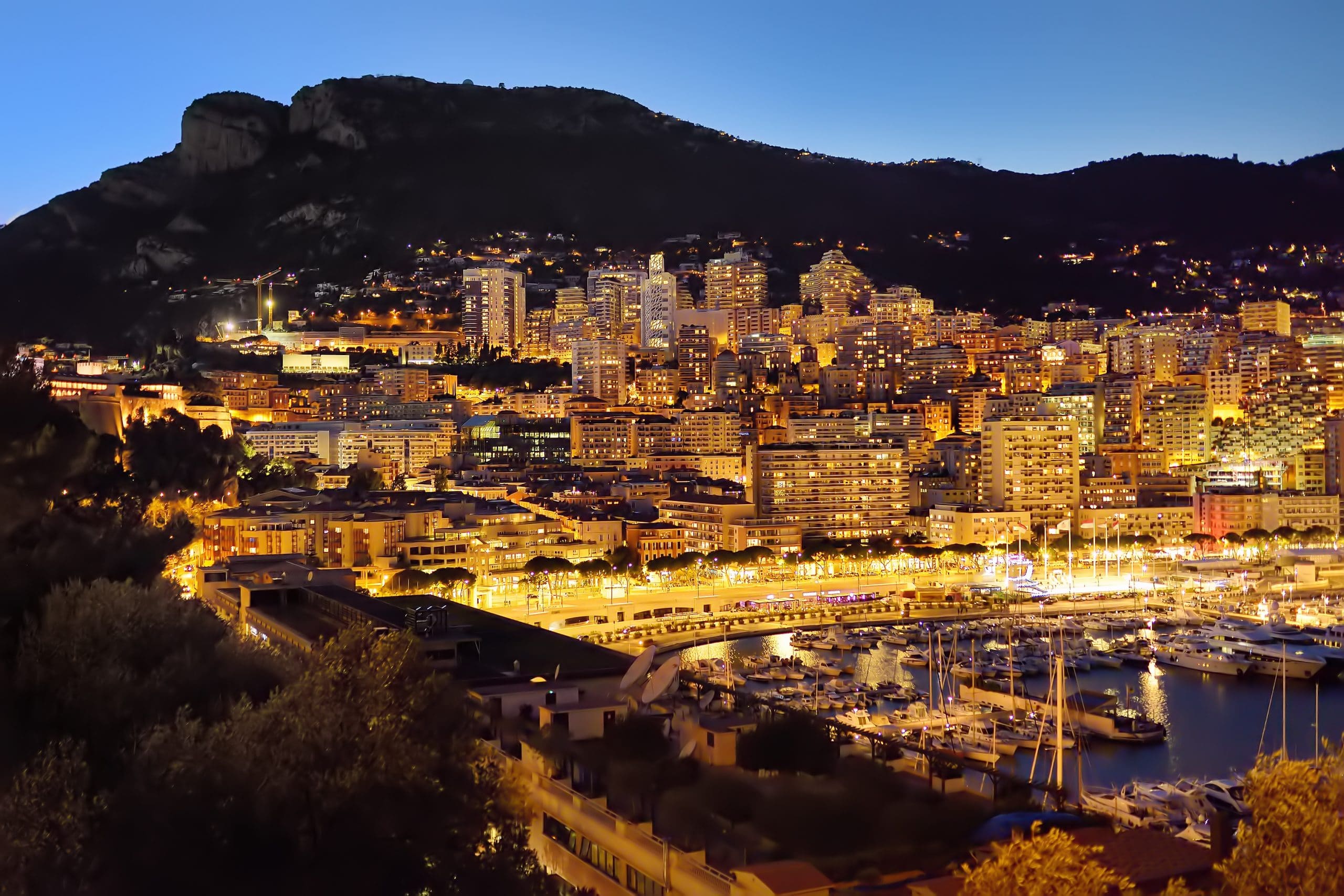 monaco-night-monte-carlo-casino-evening-french-port-riviera-france-aerial-architecture-blue-boat_t20_G0xXdR